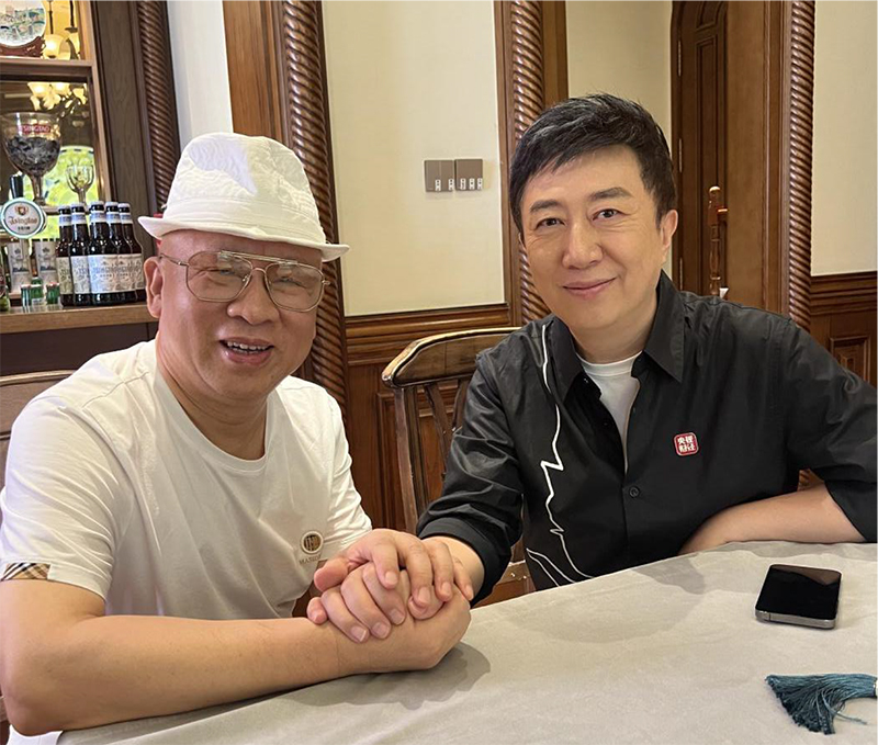 張博會長與中央電視臺主持人陳偉鴻合影